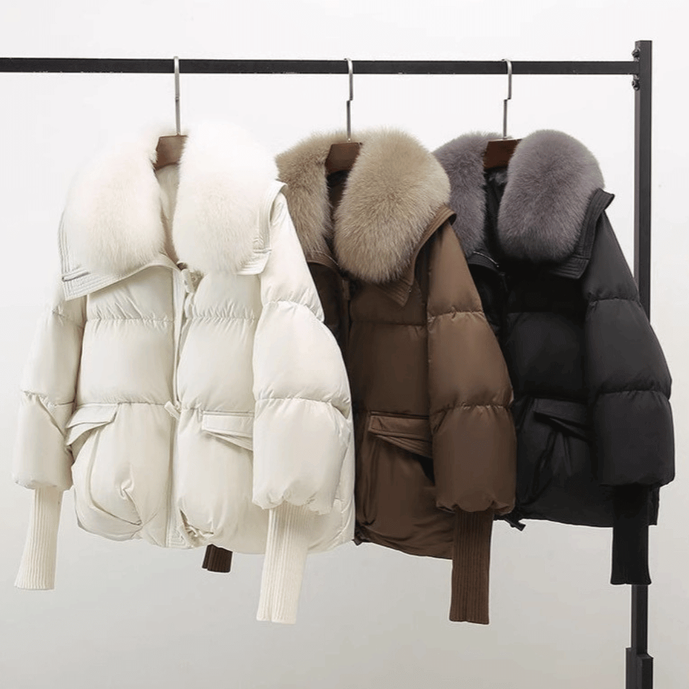 Die elegante und kuschelig warme Winterjacke mit Kunstpelzkragen